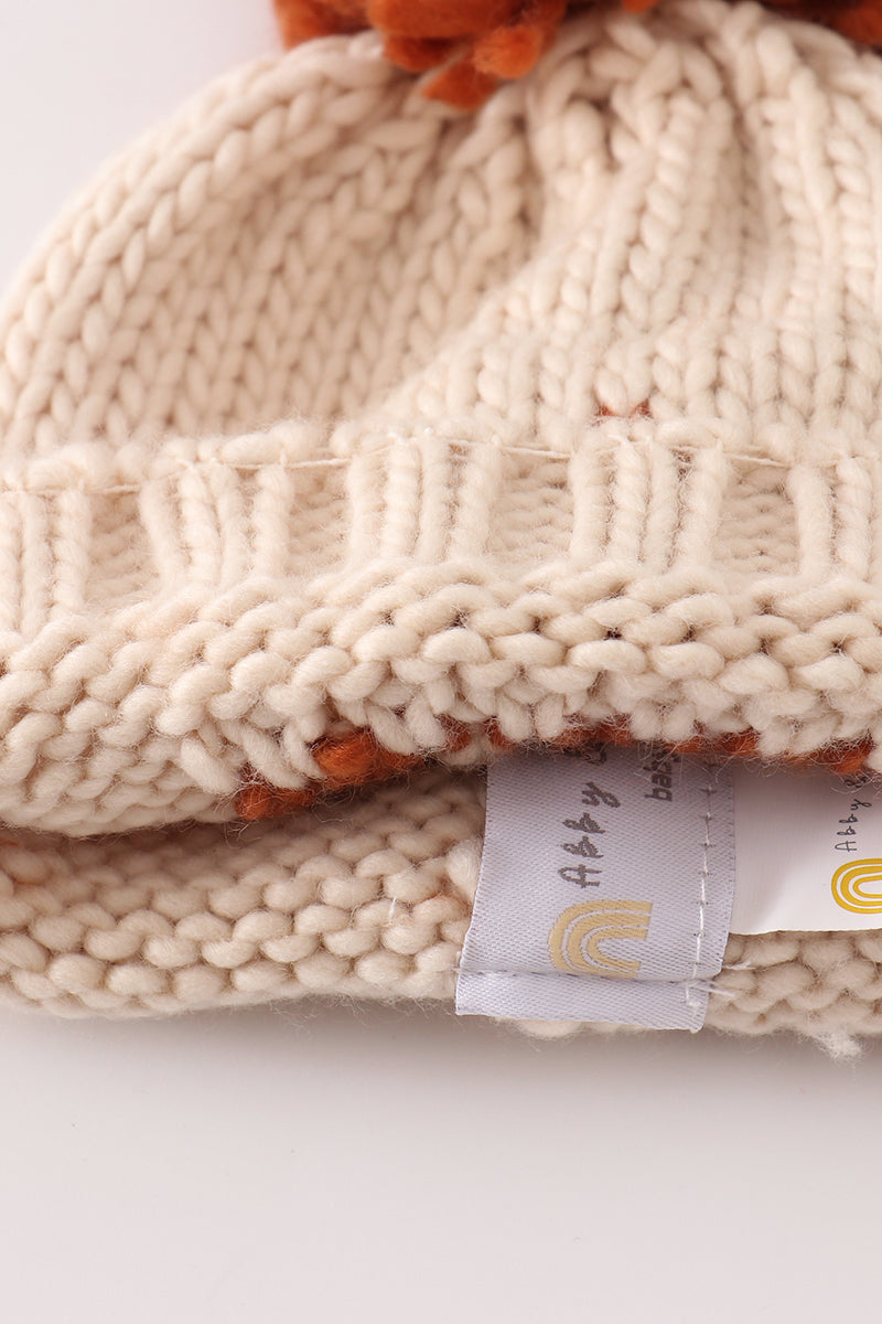 Beige pompom hi cable beanie hat