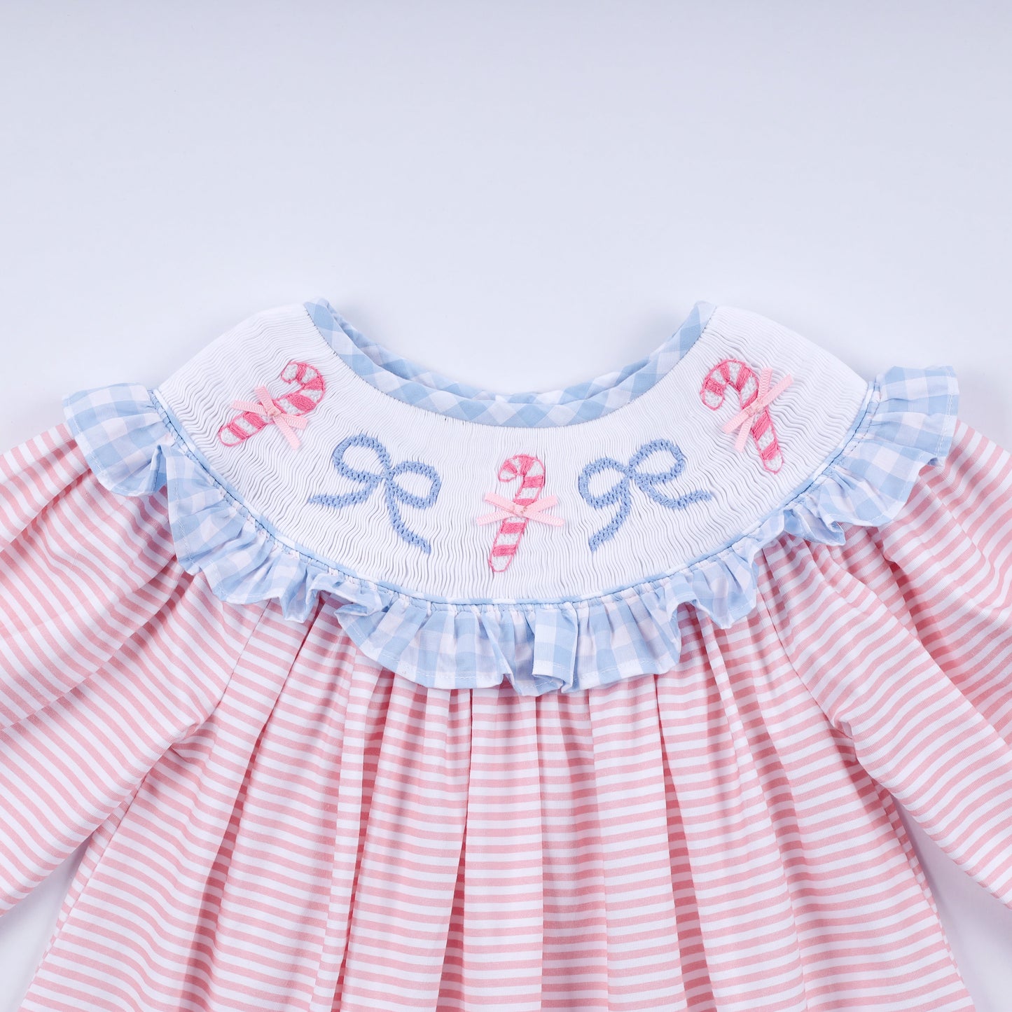 Pink candy cane bow hand smocked ruffle dress
