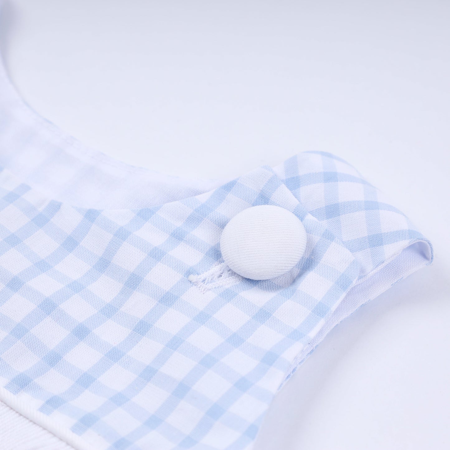 Blue character hand smocked gingham bubble